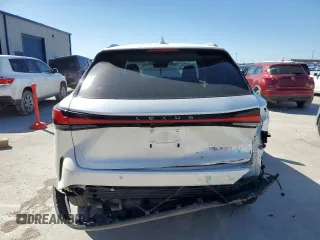 2023 Lexus RX with VIN JTJCHMAA4P2006710, listed as a Copart auction lot 47495525 with 0 mi miles and Salvage Title. Bid and sale history available at carsss.com. Image 6.
