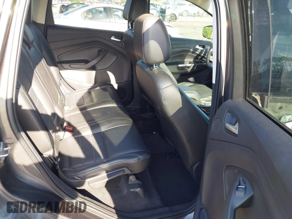 2016 Ford Escape Titanium with VIN 1FMCU9J94GUA63359, listed as a IAAI auction lot 41954514 with 94,315 mi miles. Bid and sale history available at carsss.com. Image 8.
