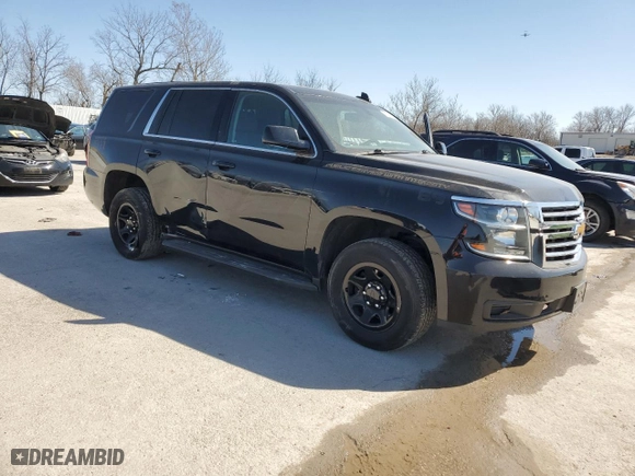 2020 Chevrolet Tahoe Commercial with VIN 1GNSKDEC5LR252282, listed as a Copart auction lot 48321235 with 97,338 mi miles and Salvage Title. Bid and sale history available at carsss.com. Image 4.