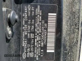 2012 Hyundai Veloster w/Black Int with VIN KMHTC6AD4CU061160, listed as a Copart auction lot 54139415 with 124,468 mi miles and Clean title. Bid and sale history available at DreamBid. Image 12.