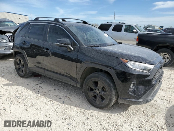 2019 Toyota RAV4 XLE with VIN JTMW1RFV5KD500679, listed as a Copart auction lot 48762575 with 105,403 mi miles and Salvage Title. Bid and sale history available at carsss.com. Image 4.