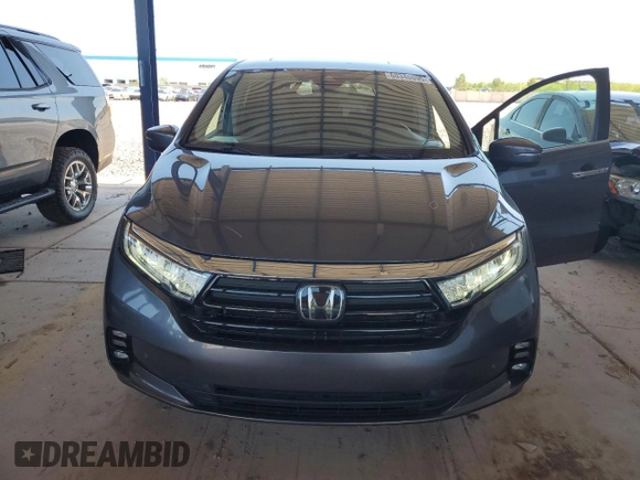 2021 Honda Odyssey Touring with VIN 5FNRL6H88MB040703, listed as a Copart auction lot 60340095 with 66,171 mi miles and Salvage title. Bid and sale history available at DreamBid. Image 5.