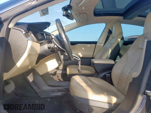 2014 Tesla Model S 60 с VIN 5YJSA1H16EFP50018, выставлен на аукционе Copart как лот 64372605 с пробегом 165 910 миль миль и Списание • Salvage title. История ставок и продаж доступна на DreamBid. Изображение 7.