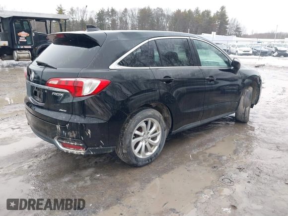 2016 Acura RDX with VIN 5J8TB4H38GL015305, listed as a IAAI auction lot 41672385 with 121,623 mi miles. Bid and sale history available at carsss.com. Image 4.