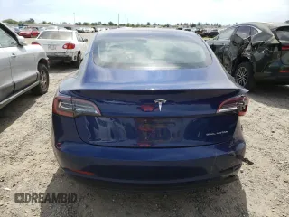 2018 Tesla Model 3 Long Range Battery with VIN 5YJ3E1EB3JF093680, listed as a Copart auction lot 52757865 with 60,598 mi miles and Salvage Title. Bid and sale history available at DreamBid. Image 6.
