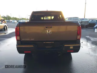 2019 Honda Ridgeline RTL-T z VIN 5FPYK2F67KB001839, wystawiony jako IAAI lot #41655998 z przebiegiem 82 578 mil mil oraz . Historia ofert i sprzedaży dostępna na DreamBid. Obrazek 17.