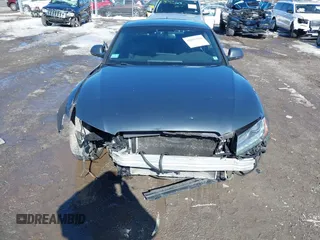 2009 Audi A5 z VIN WAUDK78T29A019706, wystawiony jako IAAI lot #41697518 z przebiegiem 136 722 mil mil oraz . Historia ofert i sprzedaży dostępna na DreamBid. Obrazek 12.