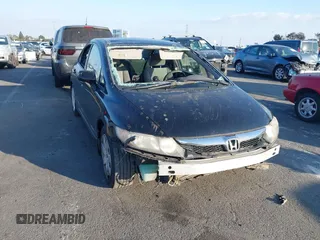 2009 Honda Civic LX z VIN 19XFA16569E022041, wystawiony jako IAAI lot #41466238 z przebiegiem 159 083 mil mil oraz . Historia ofert i sprzedaży dostępna na DreamBid. Obrazek 1.