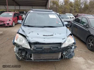 2009 Honda CR-V EX-L with VIN JHLRE387X9C006107, listed as a IAAI auction lot 41714040 with 258,016 mi miles. Bid and sale history available at carsss.com. Image 12.