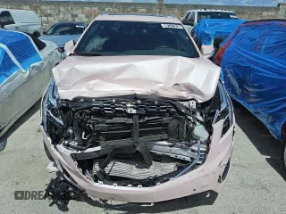 2023 Cadillac XT5 FWD Premium Luxury z VIN 1GYKNCR45PZ160005, wystawiony jako Copart lot #59147325 z przebiegiem 70 322 mil mil oraz Szkoda całkowita • Salvage title. Historia ofert i sprzedaży dostępna na DreamBid. Obrazek 5.