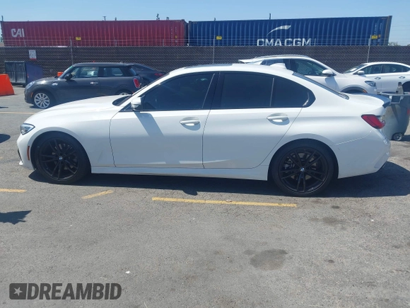 2021 BMW 3 Series 330i with VIN 3MW5R1J07M8C10703, listed as a IAAI auction lot 42272574 with 49,123 mi miles and . Bid and sale history available at DreamBid. Image 14.