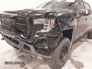 2020 GMC Sierra 1500 Denali with VIN 1GTU9FEL8LZ176453, listed as a IAAI auction lot 42194497 with 64,932 mi miles and . Bid and sale history available at DreamBid. Image 6.
