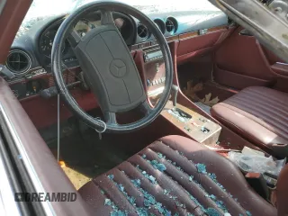 1986 Mercedes-Benz 560 SL with VIN WDBBA48D1GA040918, listed as a Copart auction lot 79708704 with 121,310 mi miles and Salvage Title. Bid and sale history available at DreamBid. Image 8.