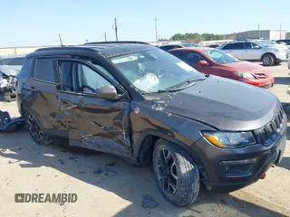 2019 Jeep Compass Trailhawk with VIN 3C4NJDDBXKT811171, listed as a IAAI auction lot 41786708 with 107,697 mi miles and . Bid and sale history available at carsss.com. Image 1.