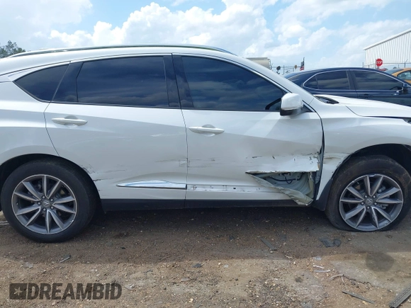 2021 Acura RDX Technology with VIN 5J8TC1H59ML023597, listed as a IAAI auction lot 41938661 with 43,441 mi miles and . Bid and sale history available at DreamBid. Image 13.