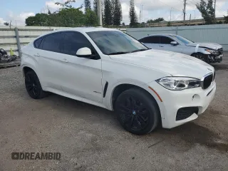 2019 BMW X6 xDrive35i with VIN 5UXKU2C5XK0Z64512, listed as a Copart auction lot 52157073 with 59,988 mi miles. Bid and sale history available at carsss.com. Image 4.