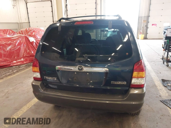 2003 Mazda Tribute LX with VIN 4F2YZ94193KM56345, listed as a IAAI auction lot 41200769 with 141,728 mi miles and . Bid and sale history available at DreamBid. Image 16.