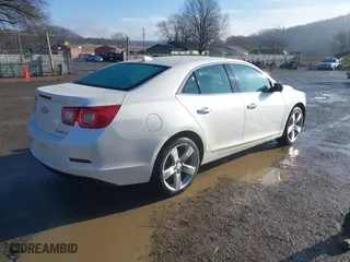 2013 Chevrolet Malibu LTZ with VIN 1G11J5SX3DF264883, listed as a IAAI auction lot 41636700 with 166,412 mi miles. Bid and sale history available at carsss.com. Image 4.