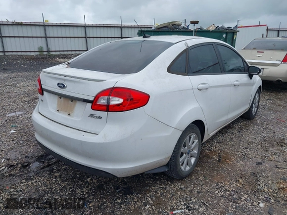 2012 Ford Fiesta SE with VIN 3FADP4BJ0CM220742, listed as a IAAI auction lot 42207303 with 175,875 mi miles and . Bid and sale history available at DreamBid. Image 4.