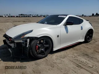 2015 Nissan 370Z Nismo z VIN JN1AZ4EH3FM441254, wystawiony jako Copart lot #52646145 z przebiegiem 74 303 mil mil oraz Szkoda całkowita • Salvage title. Historia ofert i sprzedaży dostępna na DreamBid. Obrazek 1.