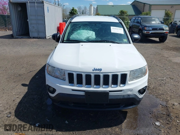 2012 Jeep Compass Sport with VIN 1C4NJDBB1CD588884, listed as a IAAI auction lot 41918765 with 199,008 mi miles. Bid and sale history available at carsss.com. Image 12.