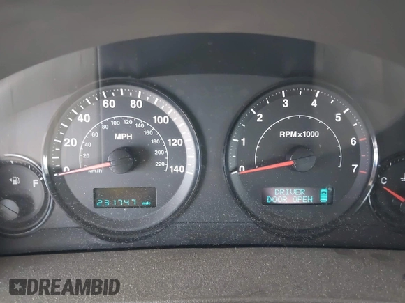 2005 Jeep Grand Cherokee Laredo with VIN 1J4GR48K25C599307, listed as a IAAI auction lot 42705166 with 231,747 mi miles and . Bid and sale history available at DreamBid. Image 7.