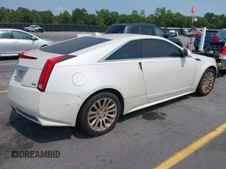 2012 Cadillac CTS Premium z VIN 1G6DP1E3XC0108543, wystawiony jako IAAI lot #42413547 z przebiegiem 80 570 mil mil oraz . Historia ofert i sprzedaży dostępna na DreamBid. Obrazek 4.