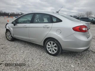 2012 Ford Fiesta SE with VIN 3FADP4BJ5CM170288, listed as a Copart auction lot 49471605 with 104,851 mi miles and Salvage Title. Bid and sale history available at DreamBid. Image 2.