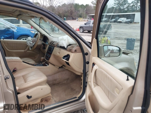 2003 Mercedes-Benz M-Class 3.2L with VIN 4JGAB54E43A383811, listed as a IAAI auction lot 41204136 with 209,327 mi miles. Bid and sale history available at carsss.com. Image 5.