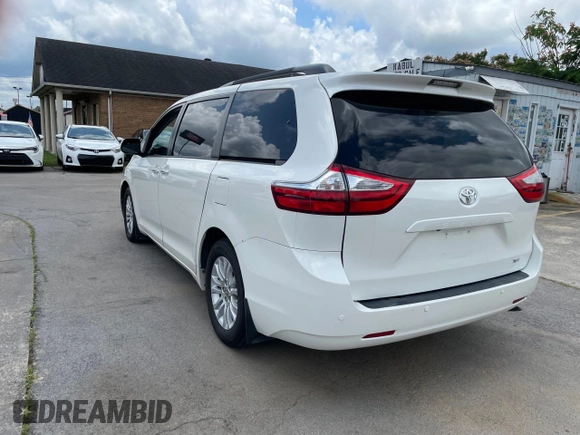 2016 Toyota Sienna XLE with VIN 5TDYK3DC3GS761177, listed as a Copart auction lot 61506935 with 134,732 mi miles and Clean title. Bid and sale history available at DreamBid. Image 3.