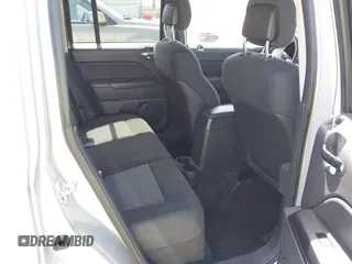 2013 Jeep Patriot Sport with VIN 1C4NJPBA7DD209591, listed as a IAAI auction lot 41945082 with 111,837 mi miles. Bid and sale history available at carsss.com. Image 8.