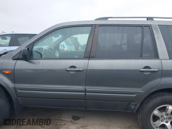 2007 Honda Pilot EX with VIN 2HKYF18497H500458, listed as a IAAI auction lot 41784273 with 114,454 mi miles. Bid and sale history available at carsss.com. Image 14.