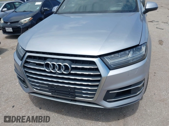 2018 Audi Q7 Prestige with VIN WA1VAAF74JD012380, listed as a IAAI auction lot 42474250 with 131,265 mi miles and . Bid and sale history available at DreamBid. Image 6.