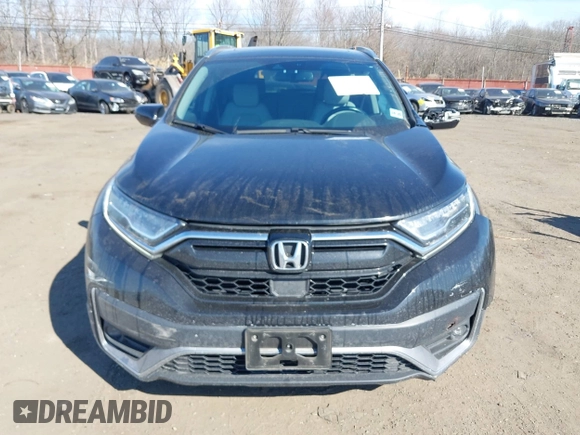 2020 Honda CR-V Touring with VIN 2HKRW2H98LH626651, listed as a IAAI auction lot 41668951 with 64,391 mi miles and . Bid and sale history available at DreamBid. Image 12.