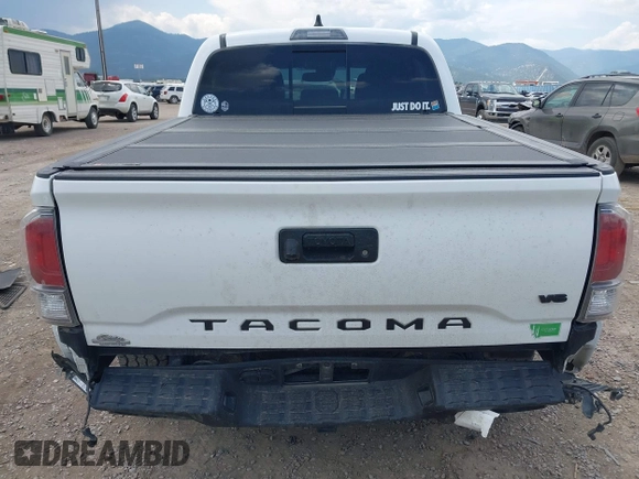 2022 Toyota Tacoma SR with VIN 3TMCZ5AN1NM478457, listed as a IAAI auction lot 42479107 with 59,547 mi miles and . Bid and sale history available at DreamBid. Image 17.