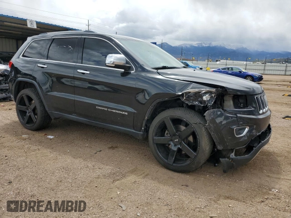 2014 Jeep Grand Cherokee Limited z VIN 1C4RJFBT6EC184557, wystawiony jako Copart lot #57657095 z przebiegiem 157 688 mil mil oraz Szkoda całkowita • Salvage title. Historia ofert i sprzedaży dostępna na DreamBid. Obrazek 4.
