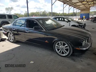 2004 Jaguar XJ с VIN SAJEA73B24TG10774, выставлен на аукционе Copart как лот 72577604 с пробегом 217 846 миль миль и Чистый • Clean title. История ставок и продаж доступна на DreamBid. Изображение 4.