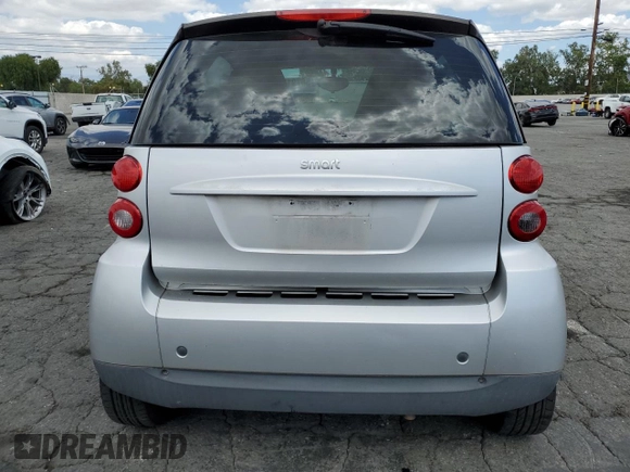 2009 Smart fortwo Pure with VIN WMEEJ31X89K251402, listed as a Copart auction lot 56791545 with 52,636 mi miles and Clean title. Bid and sale history available at DreamBid. Image 10.
