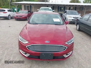 2017 Ford Fusion SE z VIN 3FA6P0HD2HR401046, wystawiony jako IAAI lot #41965539 z przebiegiem 92 664 mil mil oraz . Historia ofert i sprzedaży dostępna na DreamBid. Obrazek 12.