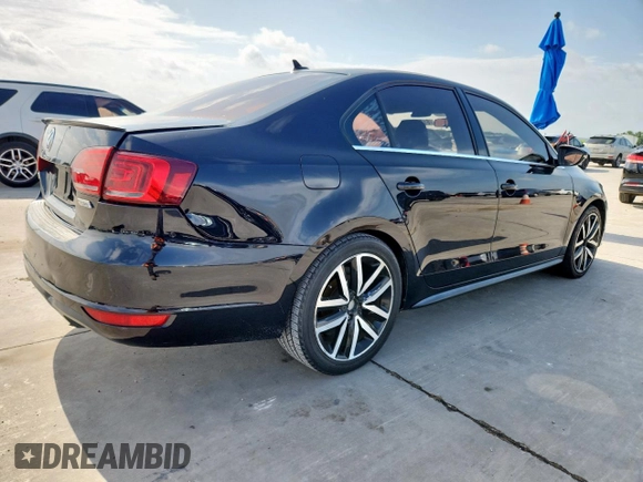 2014 Volkswagen Jetta GLI Edition 30 z VIN 3VW4S7AJ1EM390796, wystawiony jako Copart lot #61292085 z przebiegiem 138 224 mil mil oraz Czysty tytuł • Clean title. Historia ofert i sprzedaży dostępna na DreamBid. Obrazek 3.