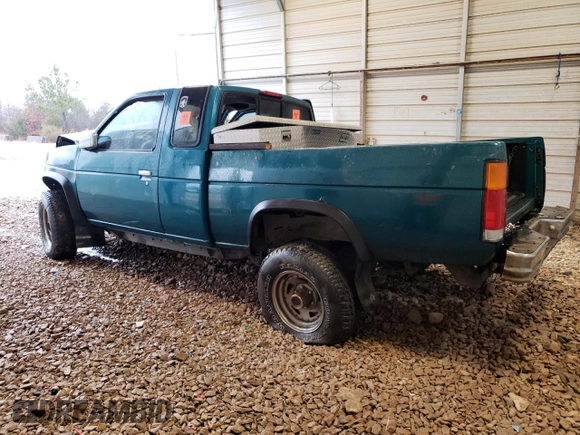 1997 Nissan Frontier XE with VIN 1N6SD16Y2VC338776, listed as a Copart auction lot 45020595 with 243,030 mi miles and Salvage title. Bid and sale history available at DreamBid. Image 2.
