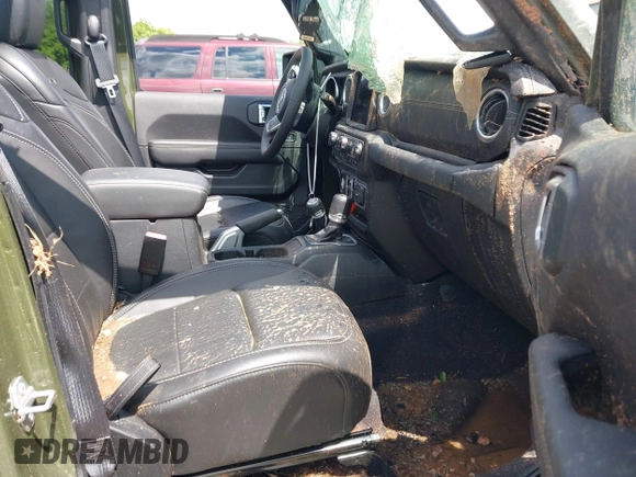 2023 Jeep Wrangler Sahara with VIN 1C4JJXP60PW556336, listed as a IAAI auction lot 39553199 with 10,437 mi miles and . Bid and sale history available at DreamBid. Image 5.