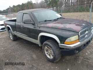 2001 Dodge Dakota SLT with VIN 1B7GG22XX1S255292, listed as a IAAI auction lot 41100133 with 168,454 mi miles and . Bid and sale history available at carsss.com. Image 1.