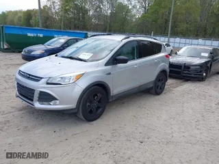 2014 Ford Escape SE with VIN 1FMCU9GX9EUA57799, listed as a IAAI auction lot 41967422 with 133,377 mi miles. Bid and sale history available at carsss.com. Image 2.