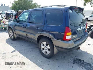 2004 Mazda Tribute ES with VIN 4F2CZ96184KM24415, listed as a IAAI auction lot 42177691 with 135,490 mi miles and . Bid and sale history available at DreamBid. Image 3.