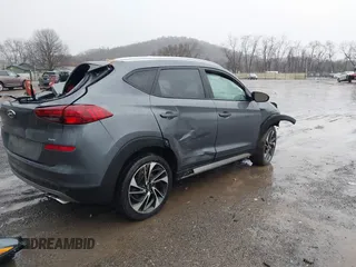 2019 Hyundai Tucson Ultimate with VIN KM8J3CAL8KU065577, listed as a IAAI auction lot 41214267 with 106,975 mi miles. Bid and sale history available at carsss.com. Image 4.