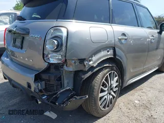 2017 MINI Countryman Cooper S z VIN WMZYT5C33H3D79148, wystawiony jako IAAI lot #42225781 z przebiegiem 95 023 mil mil oraz . Historia ofert i sprzedaży dostępna na DreamBid. Obrazek 6.