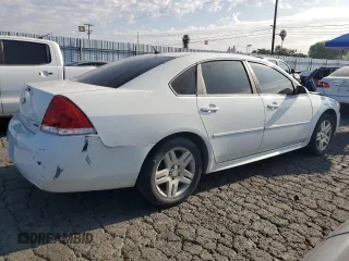 2014 Chevrolet Impala LT with VIN 2G1WB5E3XE1128402, listed as a Copart auction lot 63413525 with 101,161 mi miles and Salvage title. Bid and sale history available at DreamBid. Image 3.