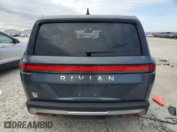 2022 Rivian R1S Launch Edition with VIN 7PDSGABL3NN000739, listed as a Copart auction lot 88127995 with 12,143 mi miles and Salvage Title. Bid and sale history available at DreamBid. Image 6.