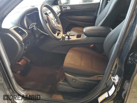 2014 Jeep Grand Cherokee Laredo with VIN 1C4RJFAG6EC371589, listed as a Copart auction lot 55657195 with 129,864 mi miles and Salvage Title. Bid and sale history available at DreamBid. Image 7.